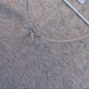 grey long sleeve heart detailing